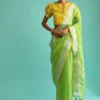 Parrot Green Saree In Linen With Silver Brocade Border And Striped Pallu Along With Yellow Unstitched Blouse - Image 2